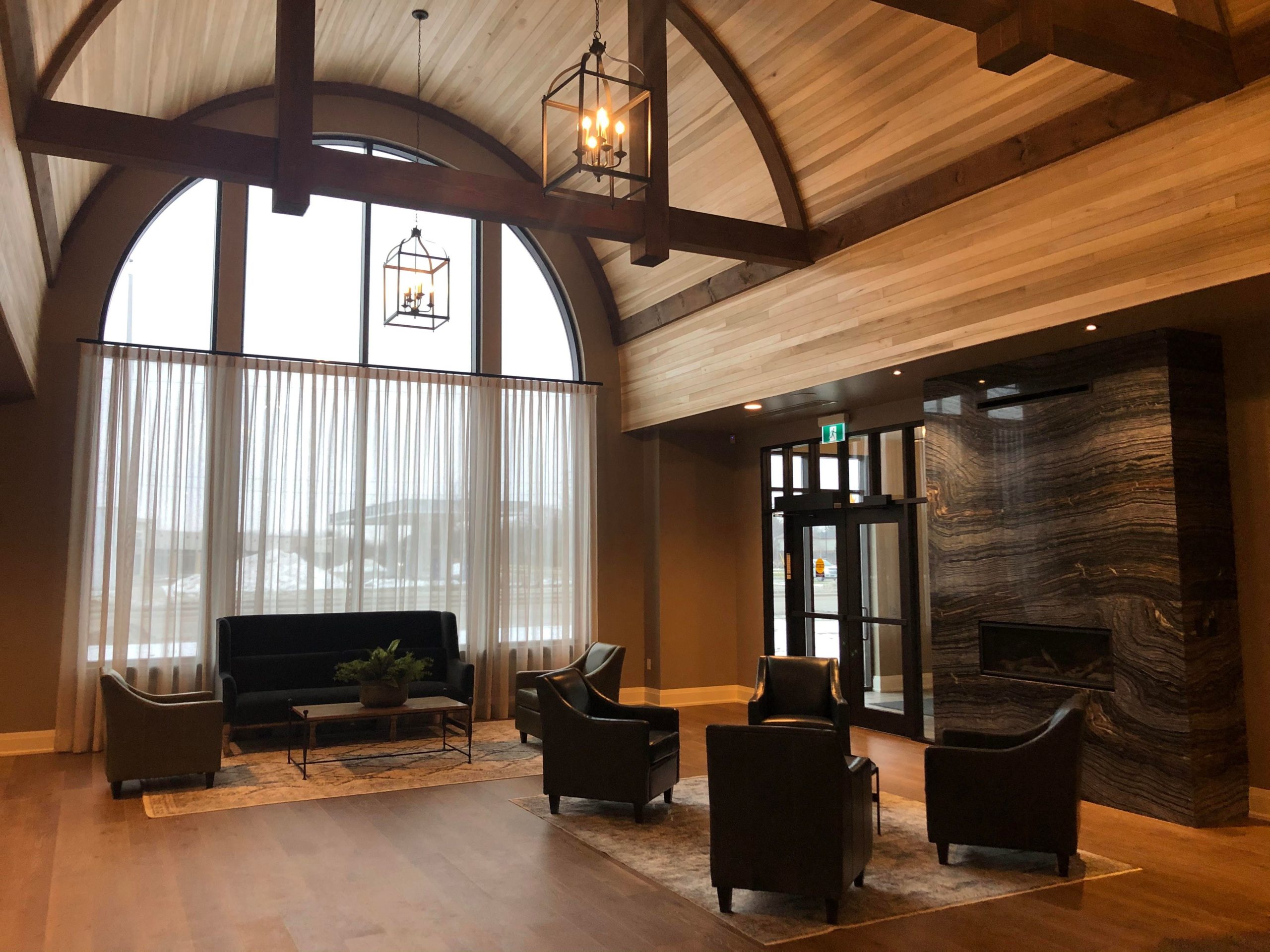 Funeral home lobby with chairs and sofas